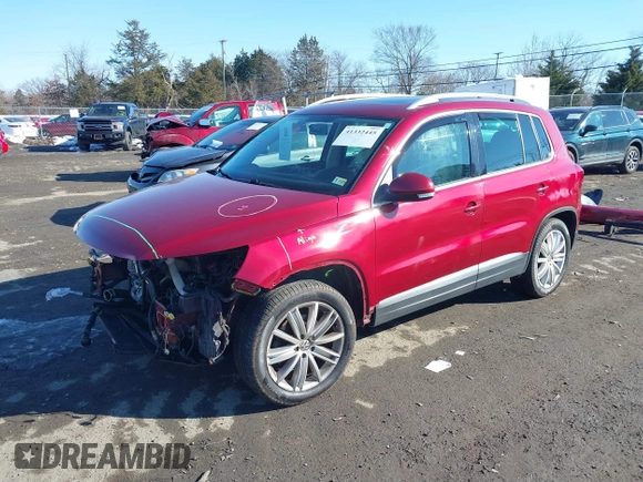 2012 Volkswagen Tiguan S with VIN WVGBV7AX2CW078629, listed as a IAAI auction lot 41332445 with 94,239 mi miles and . Bid and sale history available at DreamBid. Image 2.