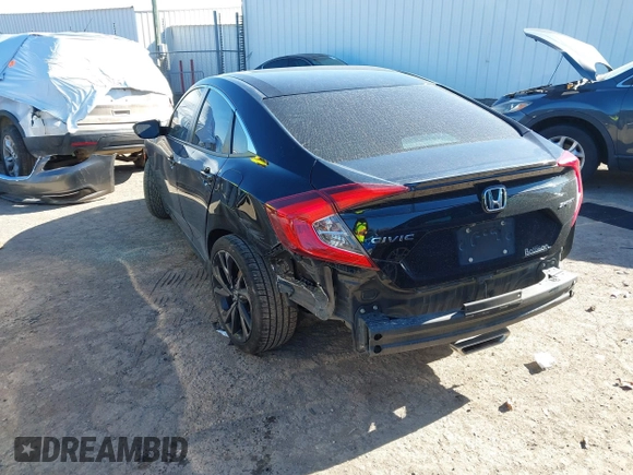 2019 Honda Civic Sport with VIN 19XFC2F80KE033598, listed as a IAAI auction lot 41732698 with 101,664 mi miles and . Bid and sale history available at DreamBid. Image 3.