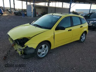 2004 Ford Focus with VIN 3FAFP37Z04R105337, listed as a Copart auction lot 43186805 with 143,267 mi miles and Salvage title. Bid and sale history available at DreamBid. Image 1.