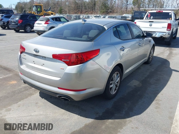 2011 Kia Optima LX with VIN KNAGM4A70B5081042, listed as a IAAI auction lot 41835721 with 203,609 mi miles and . Bid and sale history available at carsss.com. Image 4.