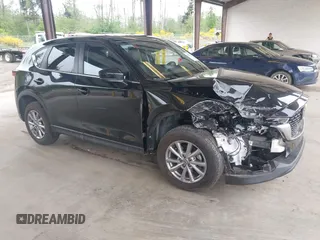 2023 Mazda CX-5 S Carbon Edition z VIN JM3KFBCM8P0140333, wystawiony jako IAAI lot #42292848 z przebiegiem 49 587 mil mil oraz . Historia ofert i sprzedaży dostępna na DreamBid. Obrazek 1.