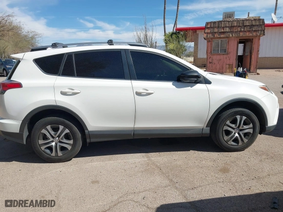 2017 Toyota RAV4 LE with VIN JTMZFREV0HJ116626, listed as a IAAI auction lot 41809294 with 110,114 mi miles. Bid and sale history available at carsss.com. Image 13.