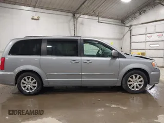 2013 Chrysler Town & Country Touring with VIN 2C4RC1BG0DR775313, listed as a IAAI auction lot 41738917 with 209,378 mi miles. Bid and sale history available at carsss.com. Image 13.
