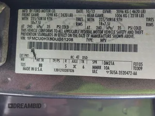 2013 Ford Escape SEL with VIN 1FMCU0HX8DUB61208, listed as a IAAI auction lot 42575283 with 140,330 mi miles and . Bid and sale history available at DreamBid. Image 9.