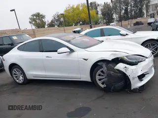 2017 Tesla Model S 60 with VIN 5YJSA1E19HF189578, listed as a IAAI auction lot 42374977 with 40,844 mi miles and . Bid and sale history available at DreamBid. Image 14.