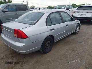 2001 Honda Civic LX with VIN 1HGES16541L049356, listed as a IAAI auction lot 42166564 with 207,913 mi miles. Bid and sale history available at carsss.com. Image 4.