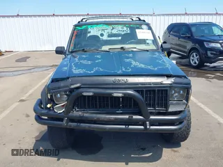 1995 Jeep Cherokee Sport with VIN 1J4FJ68S7SL631078, listed as a IAAI auction lot 42408148 with 190,765 mi miles and . Bid and sale history available at DreamBid. Image 12.