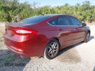 2014 Ford Fusion SE with VIN 3FA6P0H78ER239123, listed as a IAAI auction lot 42202797 with 167,086 mi miles and . Bid and sale history available at DreamBid. Image 4.