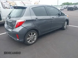 2014 Toyota Yaris L with VIN JTDKTUD38ED594008, listed as a IAAI auction lot 42114950 with 167,597 mi miles and . Bid and sale history available at DreamBid. Image 4.