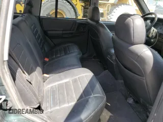 1996 Jeep Grand Cherokee Laredo z VIN 1J4GZ58S8TC222435, wystawiony jako Copart lot #62347665 z przebiegiem 202 125 mil mil oraz Czysty tytuł • Clean title. Historia ofert i sprzedaży dostępna na DreamBid. Obrazek 11.