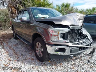 2018 Ford F-150 XL with VIN 1FTEW1EG0JFC21239, listed as a IAAI auction lot 41670005 with 96,865 mi miles. Bid and sale history available at carsss.com. Image 1.