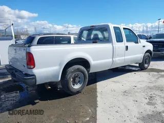 2004 Ford Super Duty F-250 XL with VIN 1FTNX20L94ED90595, listed as a IAAI auction lot 41524660 with 1 mi miles. Bid and sale history available at carsss.com. Image 4.