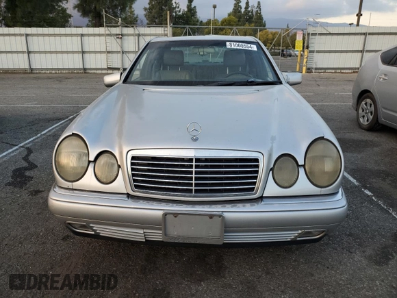 1997 Mercedes-Benz E-Class with VIN WDBJF72F4VA566949, listed as a Copart auction lot 81000554 with 187,409 mi miles and Salvage Title. Bid and sale history available at carsss.com. Image 5.
