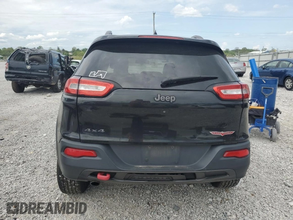 2016 Jeep Cherokee Trailhawk z VIN 1C4PJMBB8GW203534, wystawiony jako Copart lot #54403945 z przebiegiem 168 080 mil mil oraz Szkoda całkowita • Salvage title. Historia ofert i sprzedaży dostępna na DreamBid. Obrazek 6.
