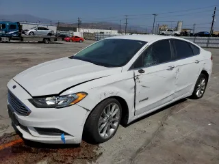 2017 Ford Fusion Hybrid SE with VIN 3FA6P0LUXHR171876, listed as a Copart auction lot 56241855 with 197,846 mi miles and Salvage title. Bid and sale history available at DreamBid. Image 1.