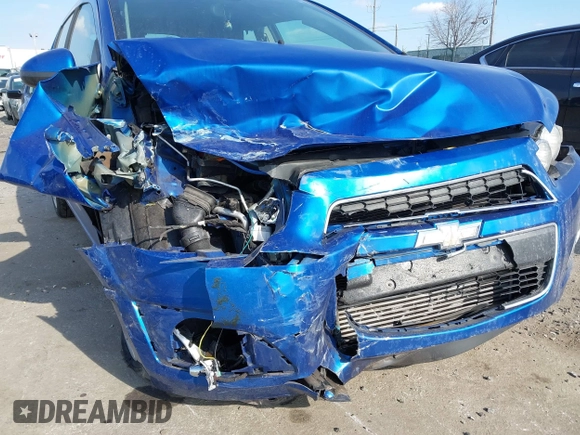 2016 Chevrolet Sonic LTZ z VIN 1G1JE6SB5G4150771, wystawiony jako IAAI lot #41662866 z przebiegiem 101 476 mil mil oraz . Historia ofert i sprzedaży dostępna na DreamBid. Obrazek 6.