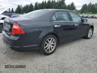 2012 Ford Fusion SEL z VIN 3FAHP0JG2CR433596, wystawiony jako Copart lot #59769105 z przebiegiem 126 230 mil mil oraz Czysty tytuł • Clean title. Historia ofert i sprzedaży dostępna na DreamBid. Obrazek 3.
