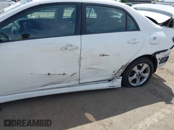 2011 Toyota Corolla L with VIN 2T1BU4EE0BC631879, listed as a IAAI auction lot 42032074 with 1 mi miles. Bid and sale history available at carsss.com. Image 6.