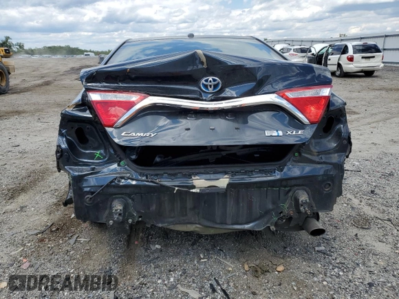2015 Toyota Camry LE with VIN 4T1BD1FK0FU157472, listed as a Copart auction lot 58009875 with 81,764 mi miles and Salvage title. Bid and sale history available at DreamBid. Image 6.