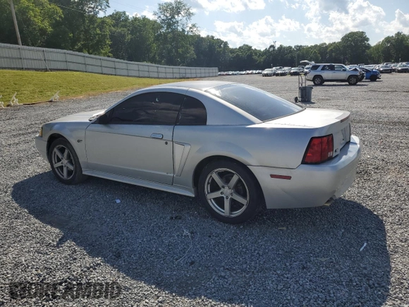 2000 Ford Mustang GT z VIN 1FAFP42X8YF309852, wystawiony jako Copart lot #57959605 z przebiegiem 251 001 mil mil oraz Szkoda całkowita • Salvage title. Historia ofert i sprzedaży dostępna na DreamBid. Obrazek 2.