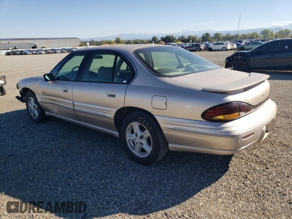 1999 Pontiac Bonneville SE z VIN 1G2HX52K4XH247855, wystawiony jako Copart lot #72559044 z przebiegiem 160 677 mil mil oraz Szkoda całkowita • Salvage title. Historia ofert i sprzedaży dostępna na DreamBid. Obrazek 2.