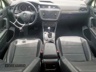 2018 Volkswagen Tiguan SEL with VIN 3VV2B7AX6JM017523, listed as a Copart auction lot 56386545 with 42,620 mi miles and Salvage title. Bid and sale history available at DreamBid. Image 8.