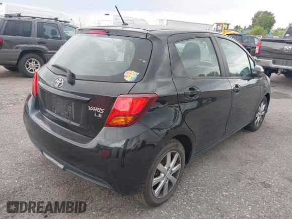 2015 Toyota Yaris L with VIN VNKKTUD33FA017154, listed as a IAAI auction lot 39828518 with 248,632 mi miles. Bid and sale history available at carsss.com. Image 4.