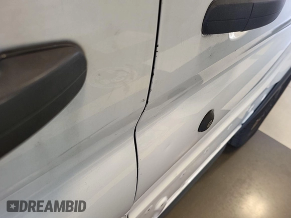 2015 Ford Transit with VIN 1FTNE2YM1FKA20300, listed as a IAAI auction lot 42634833 with 53,803 mi miles and . Bid and sale history available at DreamBid. Image 4.