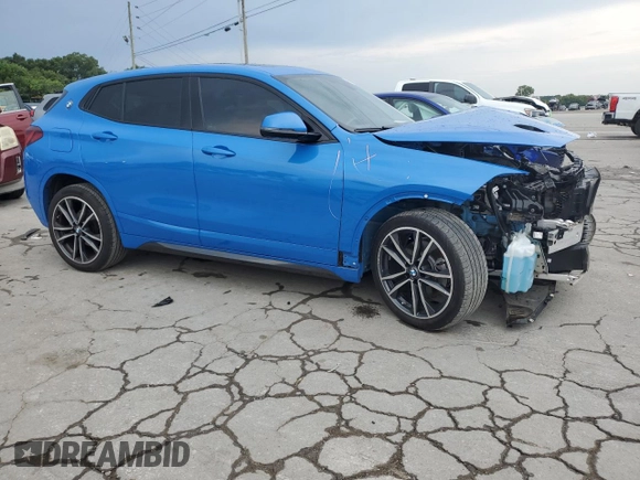 2023 BMW X2 sDrive28i with VIN WBXYH9C08P5V32303, listed as a Copart auction lot 64951994 with 22,462 mi miles and Salvage Title. Bid and sale history available at carsss.com. Image 4.