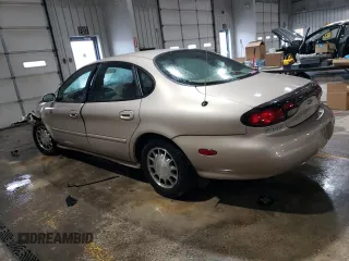 1999 Ford Taurus SE with VIN 1FAFP53S6XA242981, listed as a Copart auction lot 43211425 with 111,966 mi miles and Salvage title. Bid and sale history available at DreamBid. Image 2.