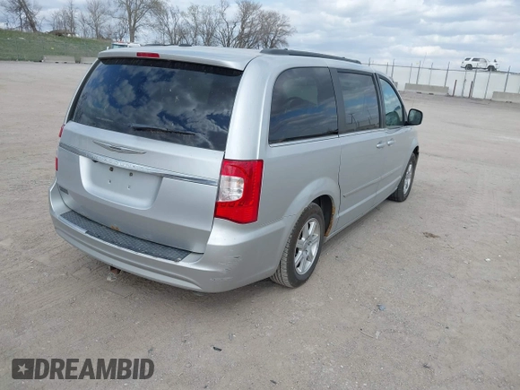 2011 Chrysler Town & Country Touring with VIN 2A4RR5DGXBR780044, listed as a IAAI auction lot 42035045 with 205,627 mi miles and . Bid and sale history available at DreamBid. Image 4.