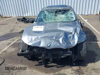2009 BMW 3 Series 328i with VIN WBAPH57599NL76702, listed as a IAAI auction lot 42361741 with Not provided miles and . Bid and sale history available at DreamBid. Image 6.