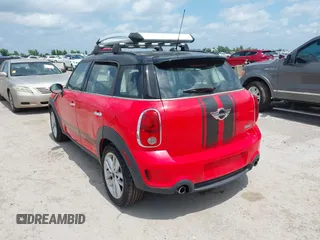 2011 MINI Countryman S z VIN WMWZC5C52BWL53856, wystawiony jako IAAI lot #42368316 z przebiegiem 107 318 mil mil oraz . Historia ofert i sprzedaży dostępna na DreamBid. Obrazek 3.