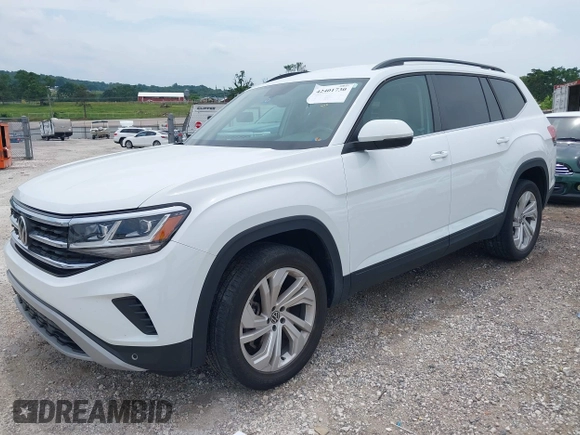 2021 Volkswagen Atlas SE with VIN 1V2HR2CA7MC556625, listed as a IAAI auction lot 42401730 with 75,261 mi miles and . Bid and sale history available at DreamBid. Image 17.