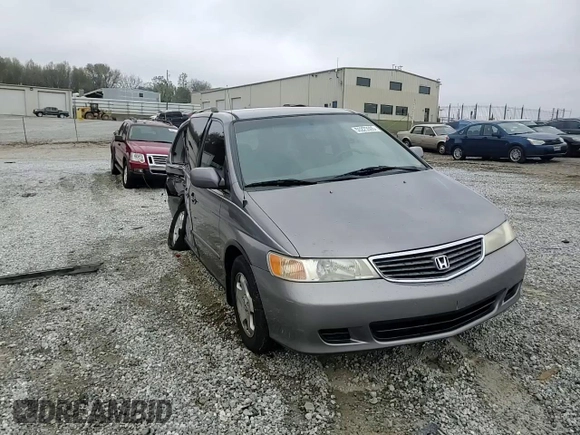 2000 Honda Odyssey EX with VIN 2HKRL1865YH513885, listed as a Copart auction lot 50223505 with 214,627 mi miles and Salvage Title. Bid and sale history available at DreamBid. Image 11.