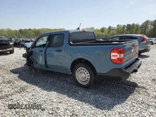 2023 Ford Maverick XL with VIN 3FTTW8E96PRA21351, listed as a Copart auction lot 51225165 with 36,387 mi miles and Salvage Title. Bid and sale history available at DreamBid. Image 2.