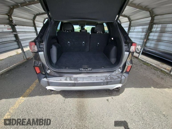 2020 Ford Escape Titanium Hybrid with VIN 1FMCU0DZ2LUB82013, listed as a IAAI auction lot 42727391 with 92,623 mi miles and . Bid and sale history available at DreamBid. Image 16.