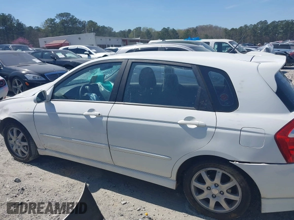 2006 Kia Spectra with VIN KNAFE162765318099, listed as a IAAI auction lot 41890796 with 241,431 mi miles. Bid and sale history available at carsss.com. Image 14.