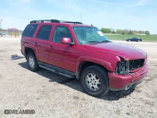 2005 Chevrolet Tahoe LT with VIN 1GNEK13T25R261555, listed as a IAAI auction lot 42060225 with 151,190 mi miles. Bid and sale history available at carsss.com. Image 1.
