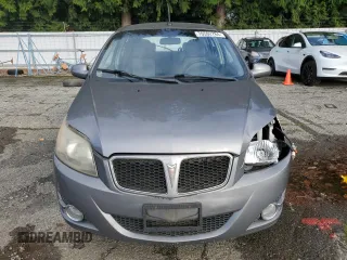 2009 Pontiac G3 z VIN KL2TD66E39B647536, wystawiony jako Copart lot #76592784 z przebiegiem 123 818 mil mil oraz Szkody całkowita. Historia ofert i sprzedaży dostępna na DreamBid. Obrazek 5.