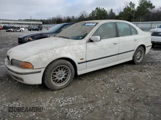 1999 BMW 5 Series 528iA with VIN WBADM633XXBY20578, listed as a Copart auction lot 68376904 with 0 mi miles and Salvage Title. Bid and sale history available at carsss.com. Image 1.