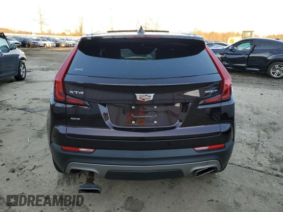 2021 Cadillac XT4 AWD Premium Luxury with VIN 1GYFZDR46MF040495, listed as a Copart auction lot 84465044 with Not Provided miles and Salvage Title. Bid and sale history available at carsss.com. Image 6.