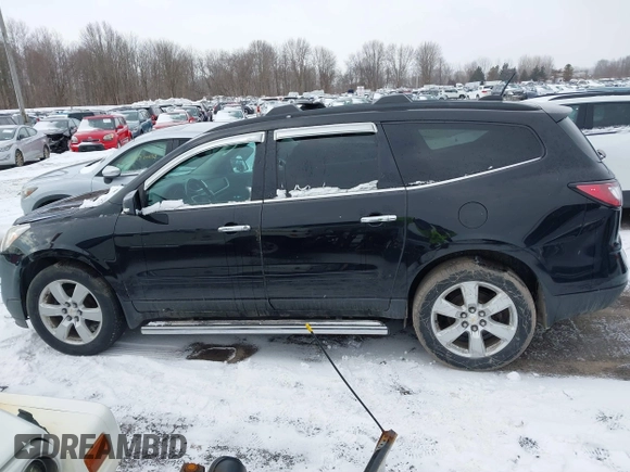 2016 Chevrolet Traverse LT with VIN 1GNKVGKDXGJ339394, listed as a IAAI auction lot 41709558 with 128,945 mi miles and . Bid and sale history available at DreamBid. Image 14.