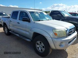2005 Toyota Tacoma PreRunner z VIN 3TMJU62N75M005365, wystawiony jako IAAI lot #42360232 z przebiegiem 224 551 mil mil oraz . Historia ofert i sprzedaży dostępna na DreamBid. Obrazek 1.