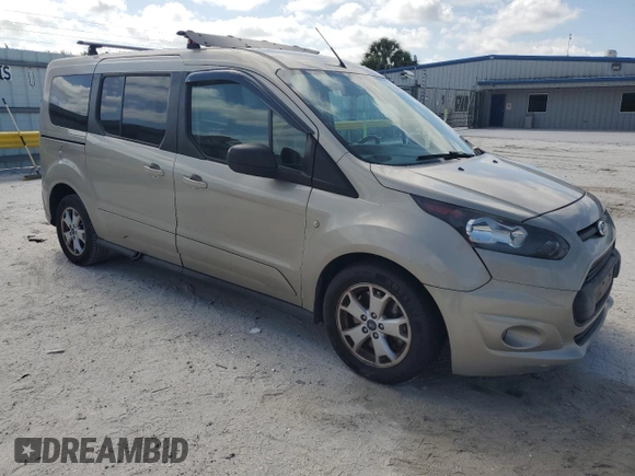 2015 Ford Transit Connect XLT with VIN NM0GS9F77F1185066, listed as a Copart auction lot 52049115 with 85,359 mi miles and Salvage title. Bid and sale history available at DreamBid. Image 4.