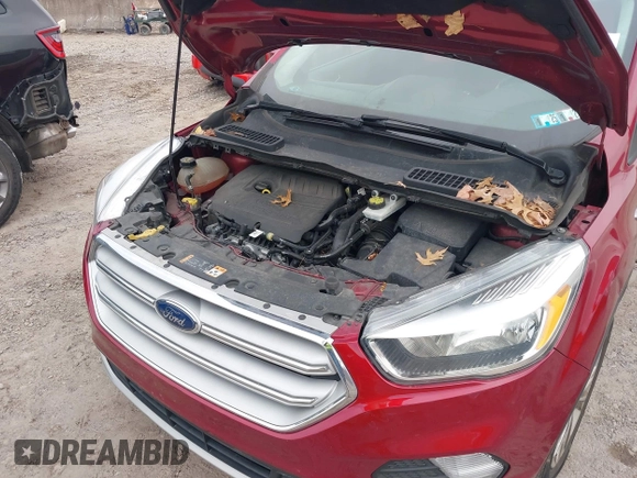2018 Ford Escape SE z VIN 1FMCU9GD6JUA18684, wystawiony jako IAAI lot #41499540 z przebiegiem 105 127 mil mil oraz . Historia ofert i sprzedaży dostępna na DreamBid. Obrazek 10.