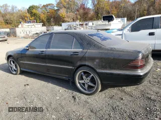 2003 Mercedes-Benz S-Class 5.0L with VIN WDBNG75J13A343070, listed as a Copart auction lot 77412604 with 154,533 mi miles and Salvage Title. Bid and sale history available at carsss.com. Image 2.