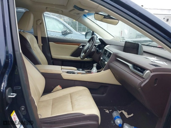 2016 Lexus RX 450h with VIN 2T2BGMCA9GC002616, listed as a IAAI auction lot 41634044 with 68,310 mi miles. Bid and sale history available at carsss.com. Image 5.