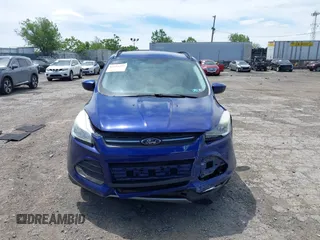 2016 Ford Escape SE z VIN 1FMCU9GX0GUA76647, wystawiony jako IAAI lot #42314233 z przebiegiem 86 010 mil mil oraz . Historia ofert i sprzedaży dostępna na DreamBid. Obrazek 13.