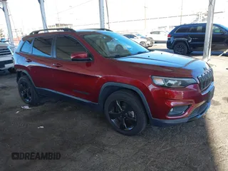 2021 Jeep Cherokee Altitude with VIN 1C4PJLLB0MD120227, listed as a IAAI auction lot 41350113 with 71,644 mi miles. Bid and sale history available at carsss.com. Image 1.